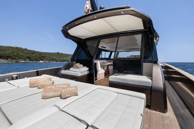 M/y Rubi Yacht Photos Pics 2024 Pardo Yachts GT52 luxury yacht with sunbathing area and elegant interior.