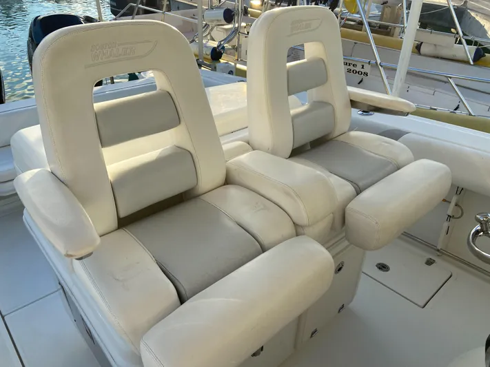 Endless Summer Yacht Photos Pics Boston Whaler 320 Outrage 2014, luxurious boat seating in cockpit.