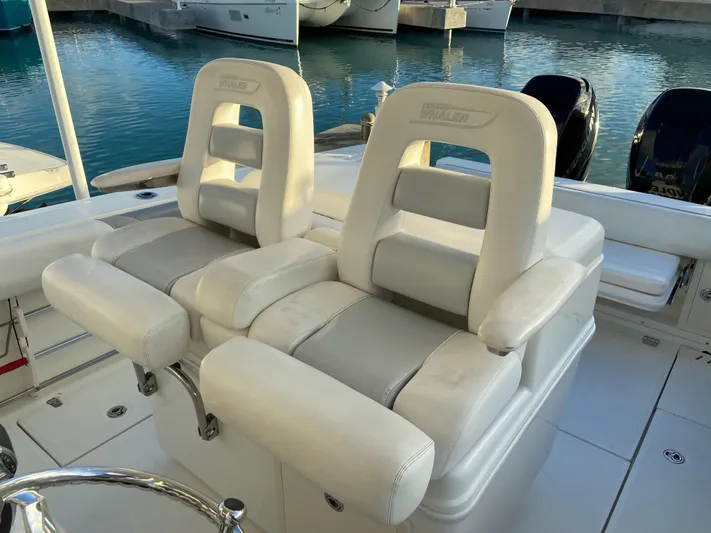 Endless Summer Yacht Photos Pics Boston Whaler 320 Outrage 2014, white cockpit seating area.