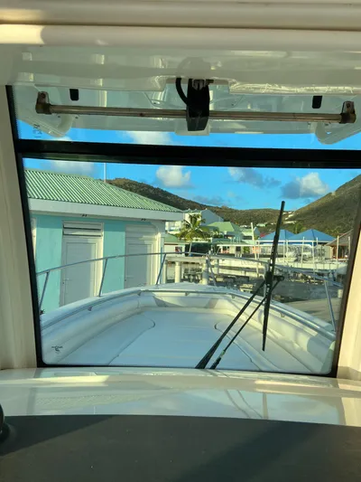 Endless Summer Yacht Photos Pics Interior view of a 2014 Boston Whaler 320 Outrage in harbor.
