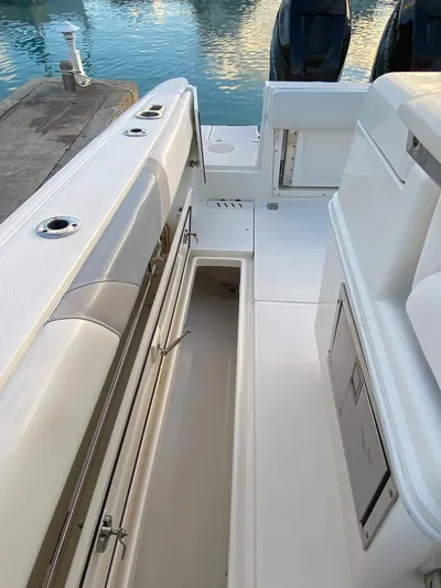 Endless Summer Yacht Photos Pics Interior of a 2014 Boston Whaler 320 Outrage boat at the dock.