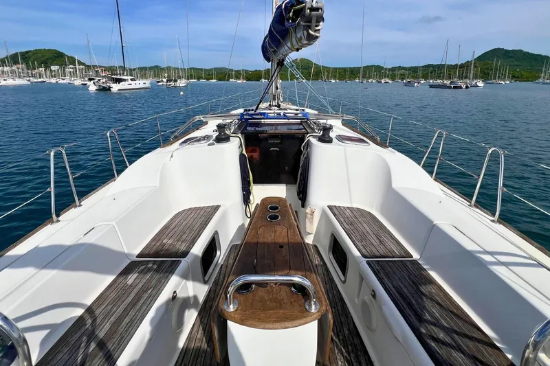  Yacht Photos Pics 2008 Jeanneau Sun Odyssey 42i Performance sailboat cockpit with scenic marina view.