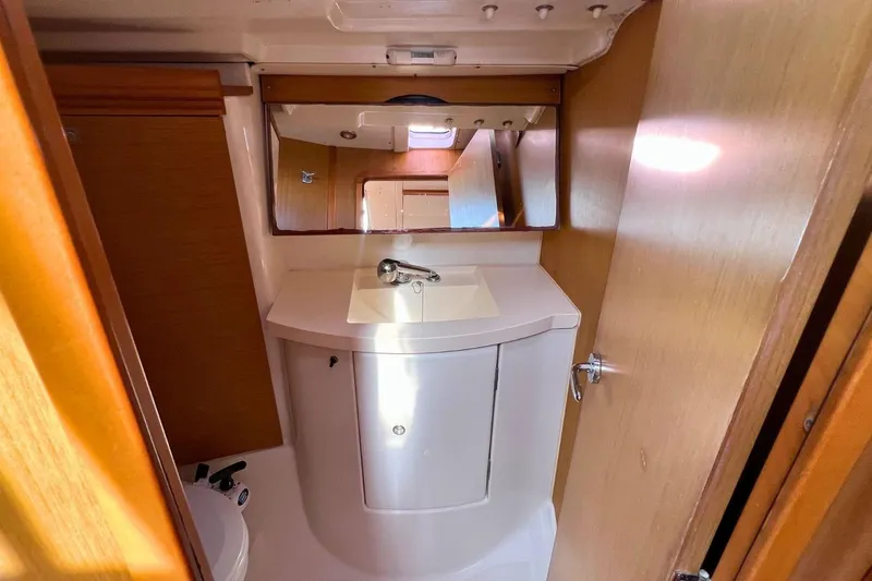  Yacht Photos Pics Bathroom interior of 2008 Jeanneau Sun Odyssey 42i Performance yacht.