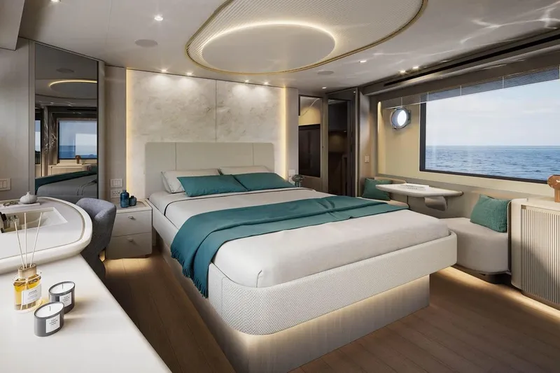  Yacht Photos Pics Luxurious bedroom interior of 2026 Absolute Navetta 66 yacht with ocean view.