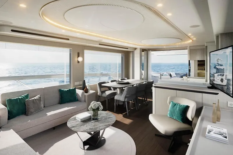  Yacht Photos Pics Luxurious interior of 2026 Absolute Navetta 66 yacht with ocean view and modern furnishings.