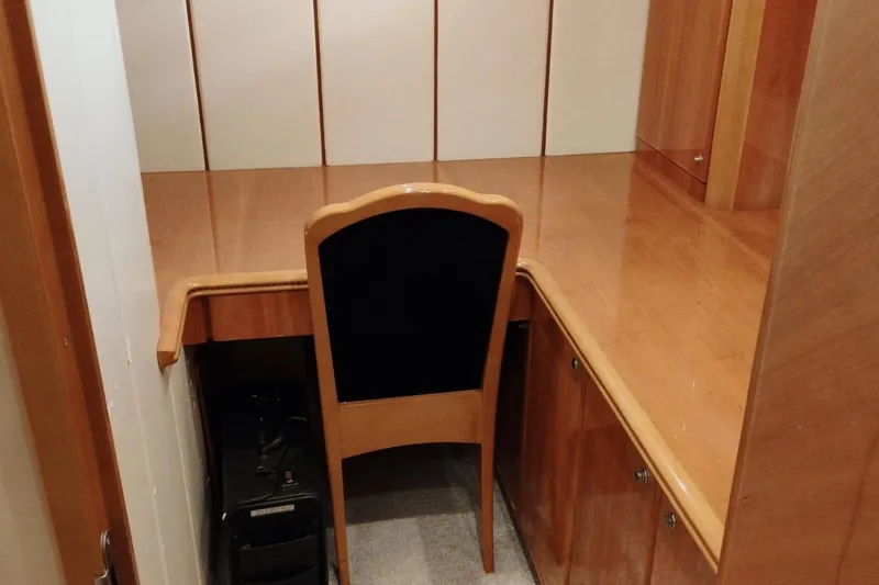  Yacht Photos Pics Wooden desk and chair in 2001 Viking Princess 72 yacht interior.