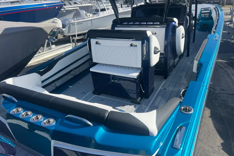  Yacht Photos Pics 2026 Nor-Tech 390 Sport Center Console boat with sleek seating and modern design.