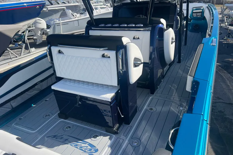  Yacht Photos Pics 2026 Nor-Tech 390 Sport Center Console interior with sleek seating and modern design.