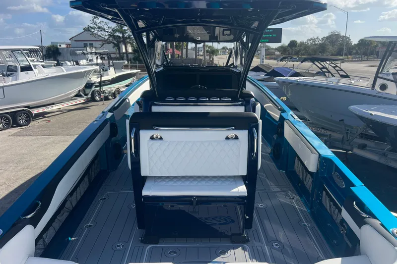  Yacht Photos Pics 2026 Nor-Tech 390 Sport Center Console boat with sleek seating and modern design.