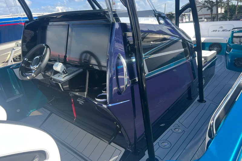  Yacht Photos Pics 2026 Nor-Tech 390 Sport Center Console with sleek dashboard and modern controls.