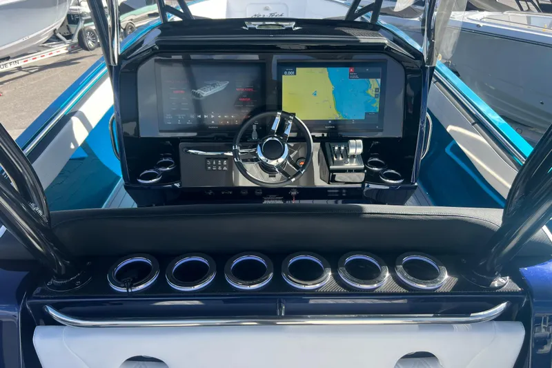  Yacht Photos Pics 2026 Nor-Tech 390 Sport Center Console dashboard with advanced navigation and control systems.