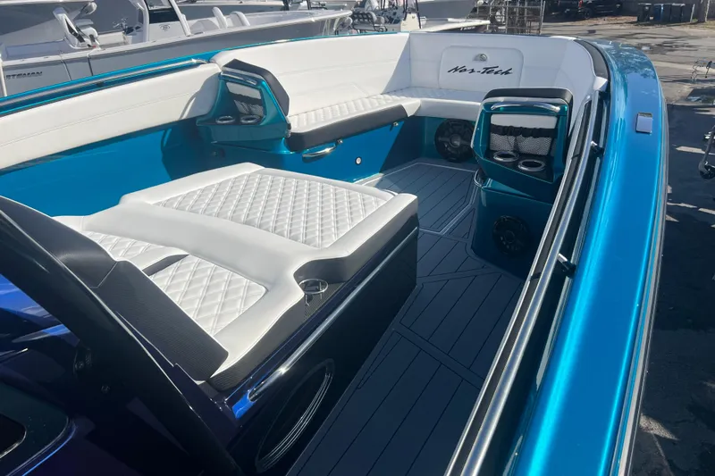  Yacht Photos Pics 2026 Nor-Tech 390 Sport Center Console with luxurious seating and sleek design.