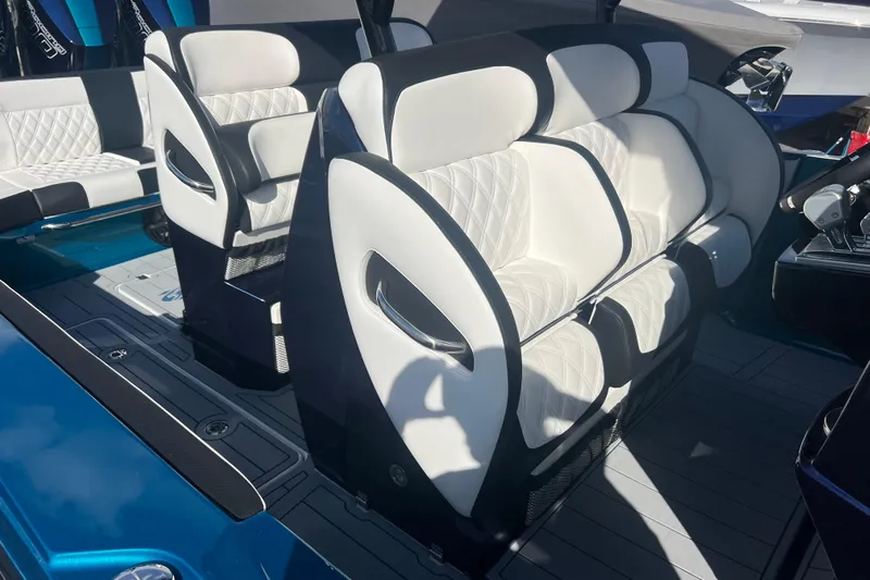  Yacht Photos Pics 2026 Nor-Tech 390 Sport Center Console with luxurious white seating and modern design.