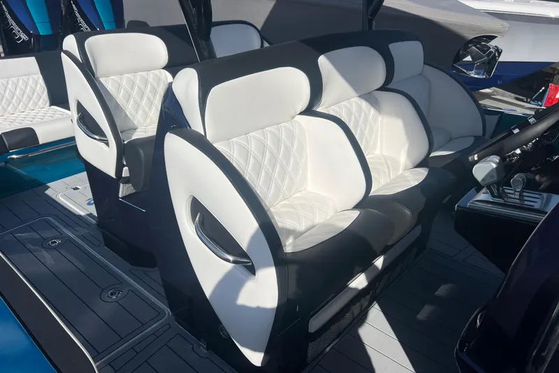  Yacht Photos Pics 2026 Nor-Tech 390 Sport Center Console with luxurious white and black seating.