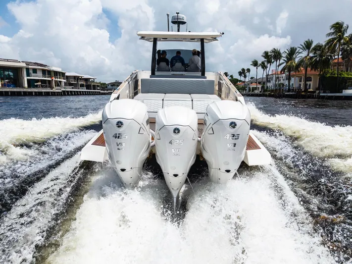 Sea-curitini Yacht Photos Pics 2024 Astondoa 377 yacht cruising with triple 425 V8 engines on a sunny day.
