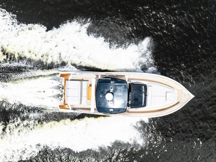 Sea-curitini Yacht Photos Pics Aerial view of 2024 Astondoa 377 yacht cruising on water.