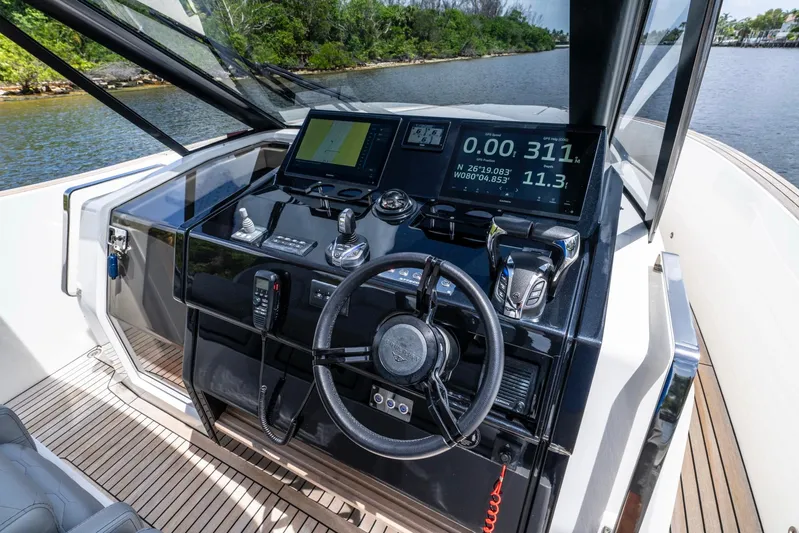 Sea-curitini Yacht Photos Pics 2024 Astondoa 377 yacht helm with advanced navigation controls and digital displays.