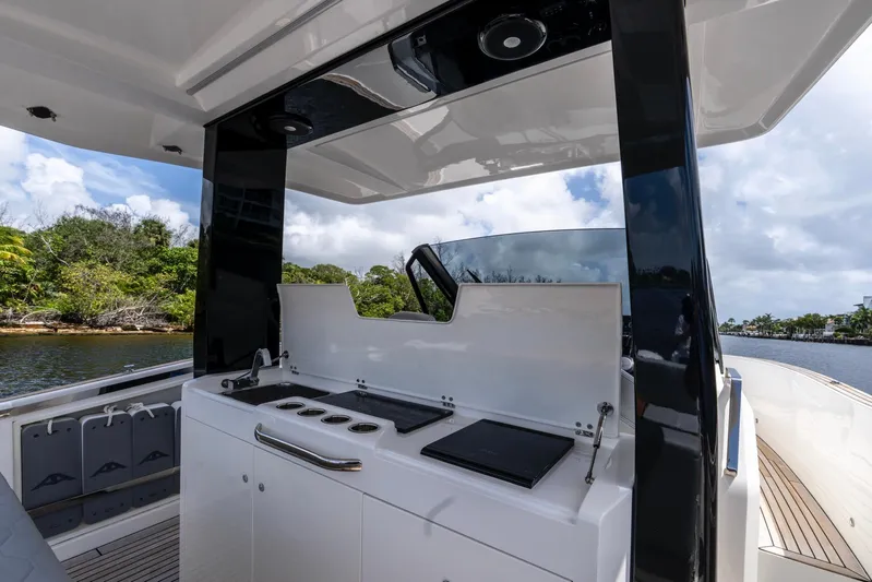 Sea-curitini Yacht Photos Pics 2024 Astondoa 377 yacht outdoor kitchen with sleek design and modern amenities.