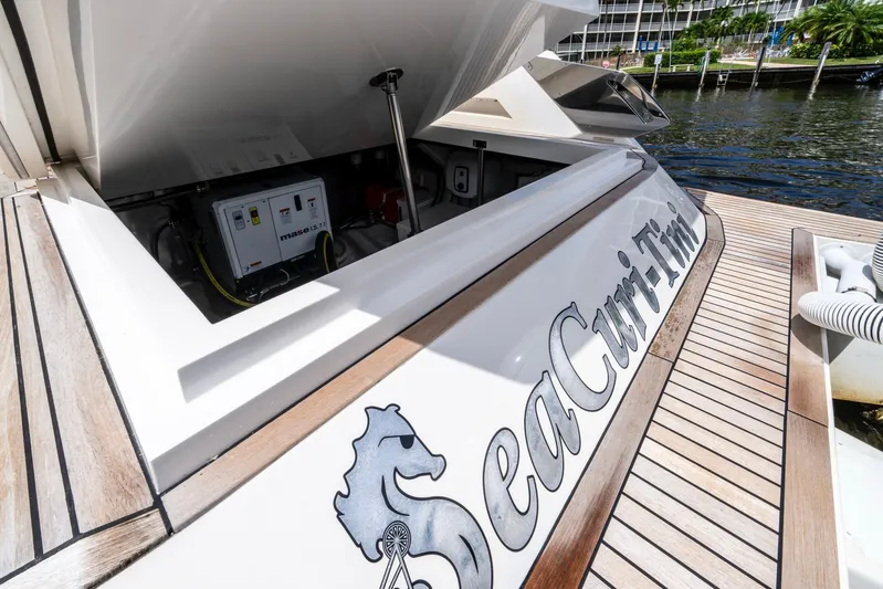 Sea-curitini Yacht Photos Pics Astondoa 377 yacht, 2024 model, featuring open engine compartment and teak deck.