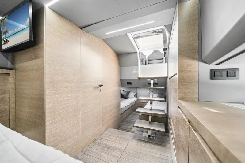 Sea-curitini Yacht Photos Pics Luxurious interior of 2024 Astondoa 377 yacht with modern wood finishes and cozy seating.