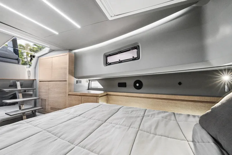 Sea-curitini Yacht Photos Pics Luxurious interior of 2024 Astondoa 377 yacht, featuring modern design and comfortable sleeping area.