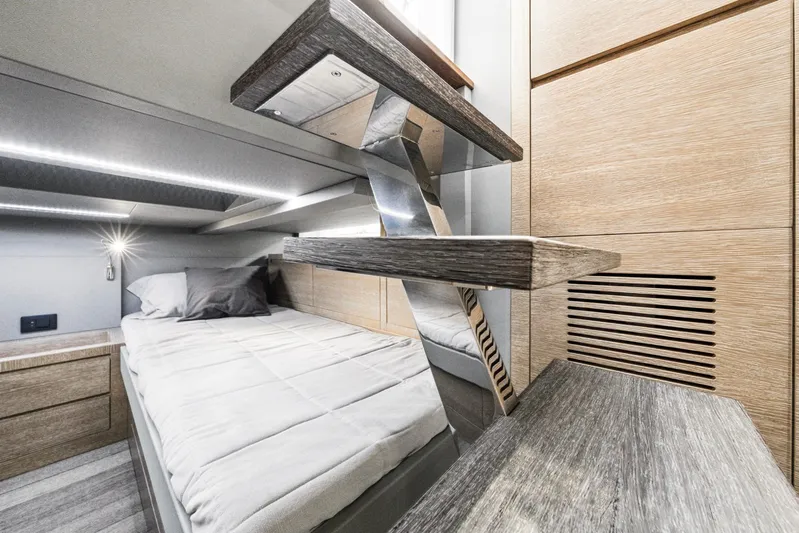 Sea-curitini Yacht Photos Pics Luxurious cabin interior of 2024 Astondoa 377 yacht with modern design and wooden accents.