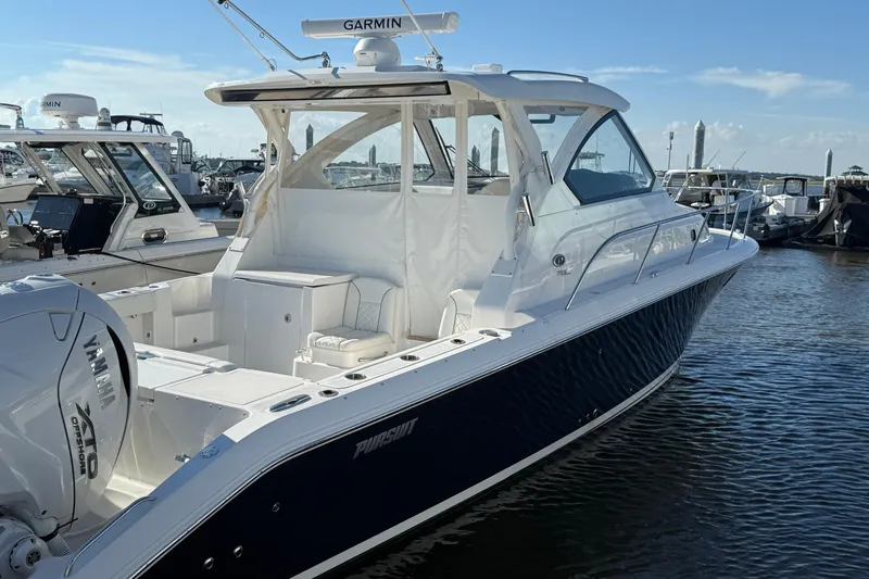 Seaquel Yacht Photos Pics 2026 Pursuit OS 355 Offshore boat docked, featuring sleek design and Yamaha engine.