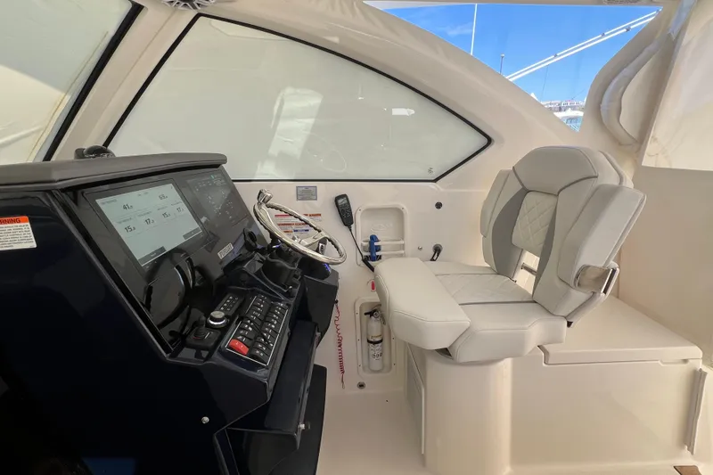 Seaquel Yacht Photos Pics 2026 Pursuit OS 355 Offshore helm with modern controls and comfortable seating.