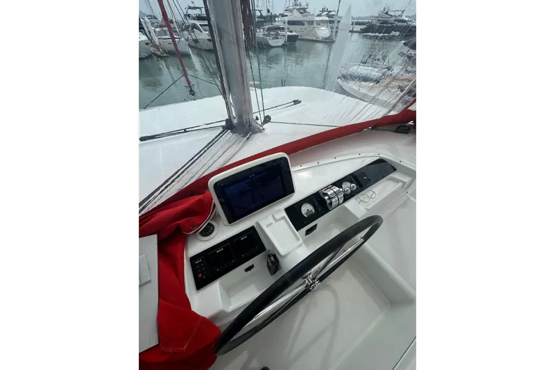 Cc Princess Yacht Photos Pics Helm of 2020 Lagoon 46 catamaran with navigation equipment and steering wheel.