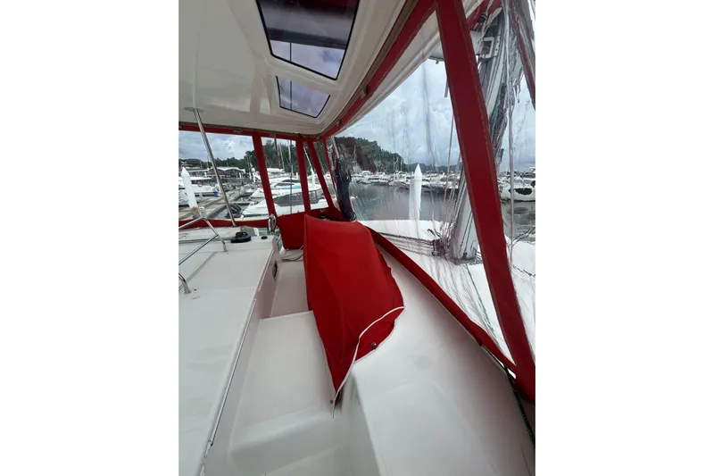 Cc Princess Yacht Photos Pics 2020 Lagoon 46 yacht with red canopy, docked at marina.