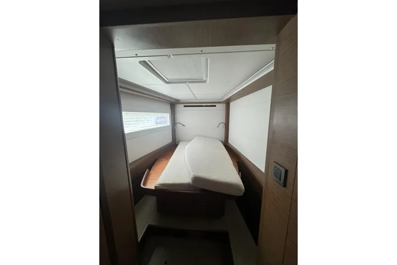 Cc Princess Yacht Photos Pics Interior cabin of 2020 Lagoon 46 yacht with bed and window.