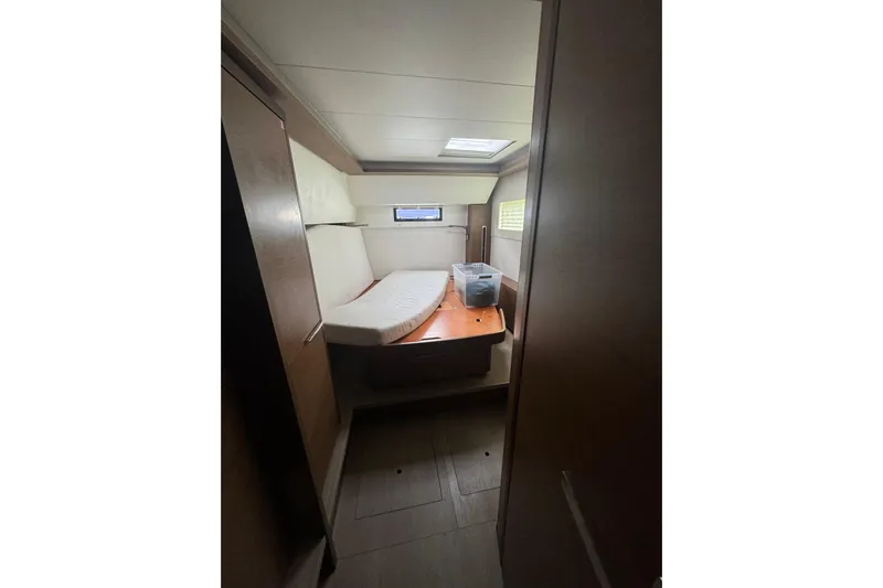 Cc Princess Yacht Photos Pics Interior cabin of 2020 Lagoon 46 catamaran with bed and storage.
