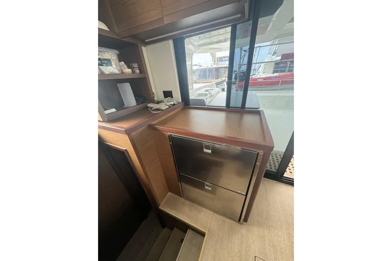 Cc Princess Yacht Photos Pics Interior of 2020 Lagoon 46 yacht with wooden cabinetry and stainless steel drawers.