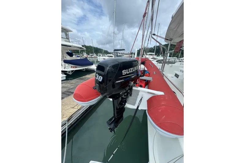 Cc Princess Yacht Photos Pics Red inflatable boat with Suzuki 30 outboard motor on Lagoon 46, 2020 model.
