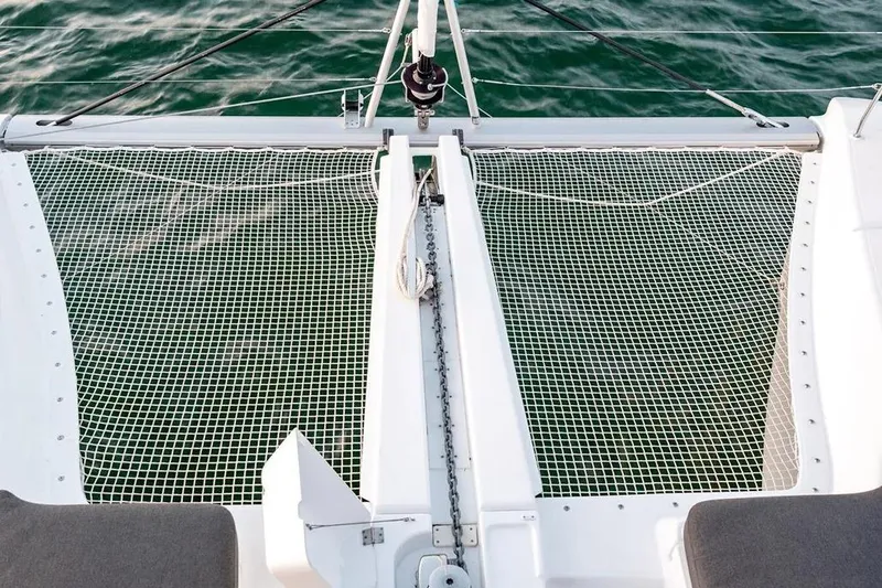 Cc Princess Yacht Photos Pics Catamaran netting on 2020 Lagoon 46, overlooking calm green water.