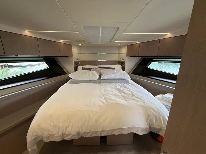 Boo Boo Yacht Photos Pics Luxurious bedroom interior of 2020 Sunseeker Predator 50 yacht with modern design.