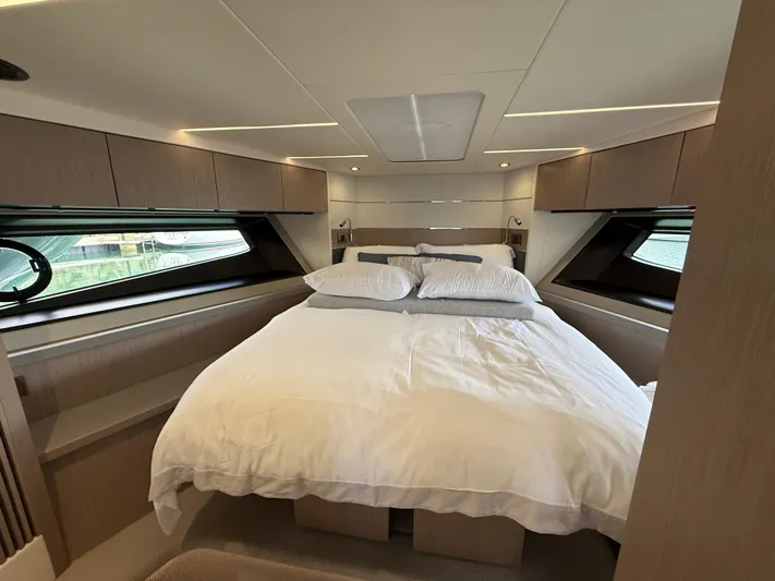 Boo Boo Yacht Photos Pics Luxurious bedroom interior of 2020 Sunseeker Predator 50 yacht with modern design.