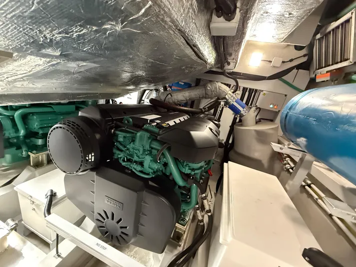 Boo Boo Yacht Photos Pics Engine room of 2020 Sunseeker Predator 50 yacht, showcasing advanced machinery and components.