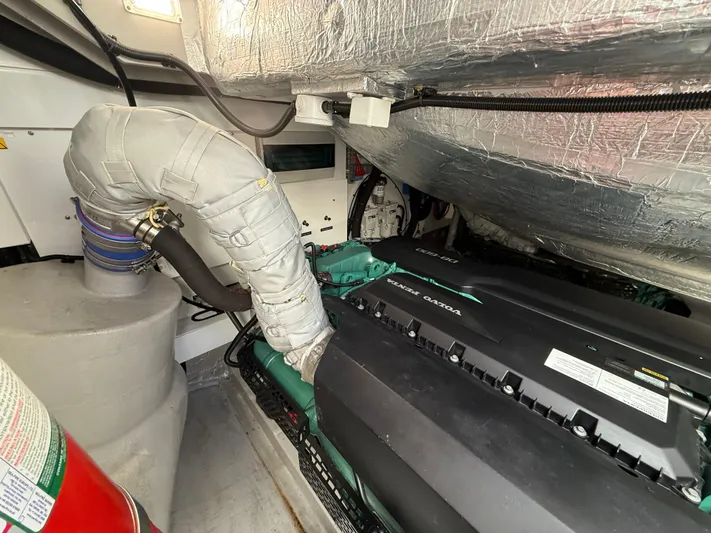 Boo Boo Yacht Photos Pics Engine room of 2020 Sunseeker Predator 50 yacht, featuring advanced machinery and insulation.