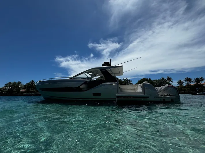 Sapore Di Mare Yacht Photos Pics Azimut 47 VERVE 2022 yacht on clear tropical waters under a bright blue sky.