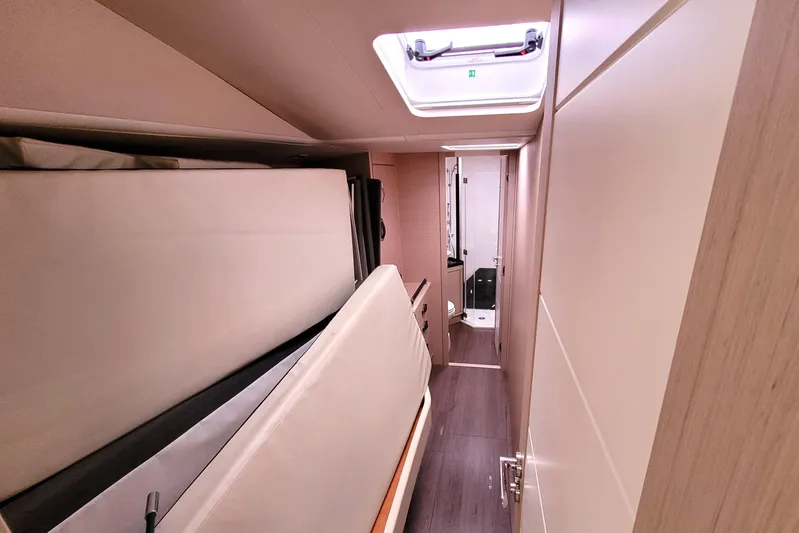 Ana Maria III Yacht Photos Pics Interior cabin of 2022 Jeanneau 65 yacht with bunk beds and modern design.