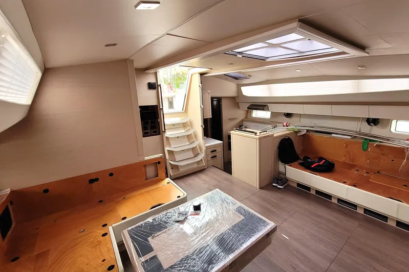 Ana Maria III Yacht Photos Pics Interior of 2022 Jeanneau 65 yacht, featuring modern design and spacious seating area.