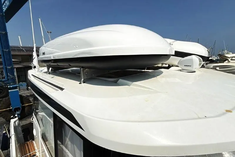  Yacht Photos Pics 2025 Jeanneau Merry Fisher 1095 boat roof with radar and equipment.