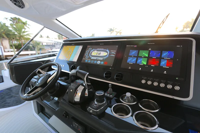 Sapore Di Mare Yacht Photos Pics Helm of 2022 Azimut 47 VERVE yacht with advanced navigation controls and touchscreen displays.