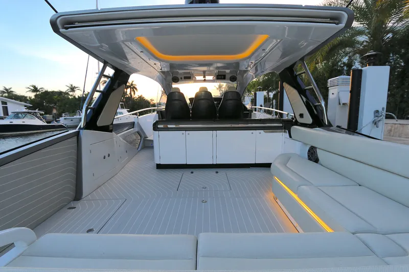 Sapore Di Mare Yacht Photos Pics Luxurious 2022 Azimut 47 VERVE yacht interior with sleek seating and ambient lighting.