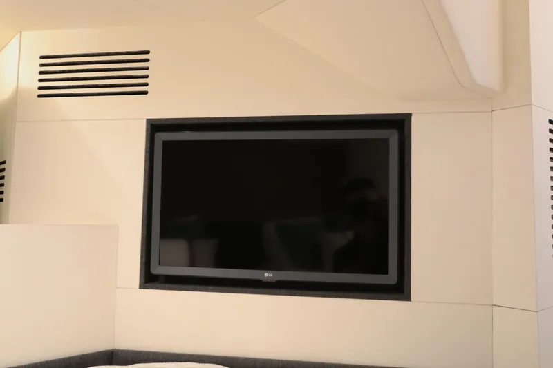 Sapore Di Mare Yacht Photos Pics Flat-screen TV in the interior of a 2022 Azimut 47 VERVE yacht.