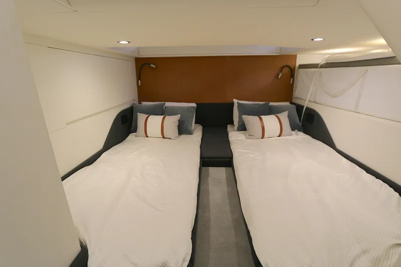 Sapore Di Mare Yacht Photos Pics Interior cabin of 2022 Azimut 47 VERVE yacht with twin beds and modern decor.