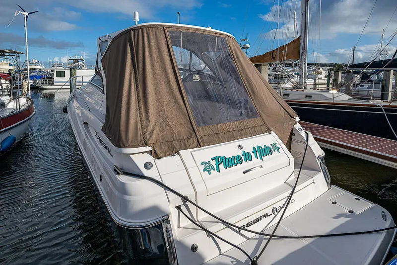  Yacht Photos Pics 2008 Regal Commodore 3760 IB yacht docked at marina, brown canopy, clear sky.