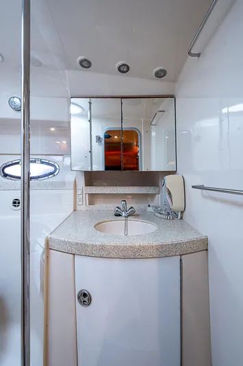  Yacht Photos Pics 2008 Regal Commodore 3760 IB yacht bathroom with modern sink and mirrored cabinet.