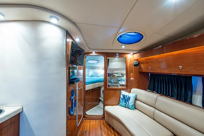  Yacht Photos Pics Luxurious interior of 2008 Regal Commodore 3760 IB yacht with plush seating and modern amenities.